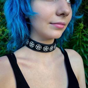 Pentacle choker necklace modeled by alternative young woman.