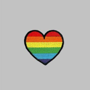 Rainbow Heart Embroidery Patch against grey background